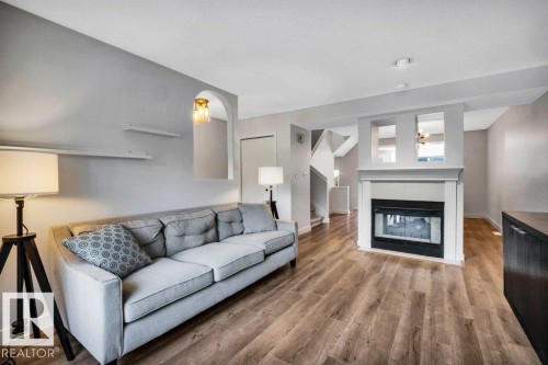 9321 98 Avenue Nw, Edmonton, AB - Indoor Photo Showing Living Room With Fireplace
