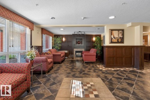 #322 7510 89 St Nw, Edmonton, AB - Indoor With Fireplace