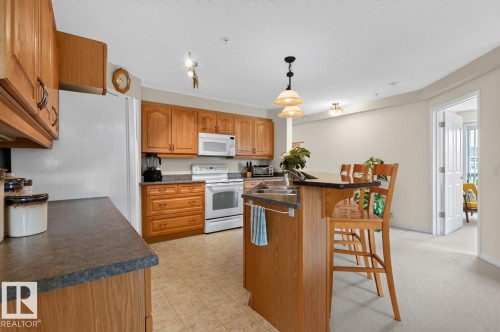 #322 7510 89 St Nw, Edmonton, AB - Indoor Photo Showing Kitchen With Double Sink