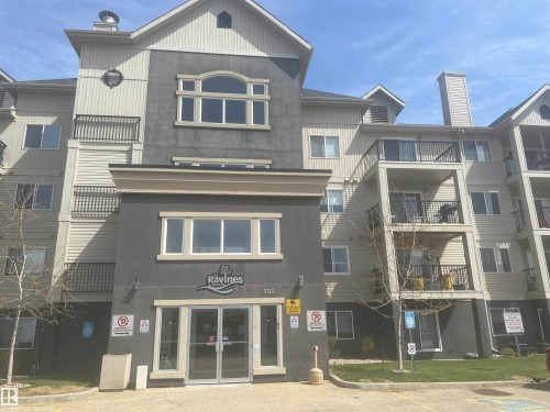 Exterior facade featuring stucco and siding finishes - #106 592 Hooke Rd Nw, Edmonton, AB 