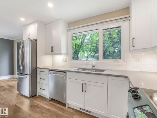 5708 144 Street Nw, Edmonton, AB - Indoor Photo Showing Kitchen With Stainless Steel Kitchen With Double Sink