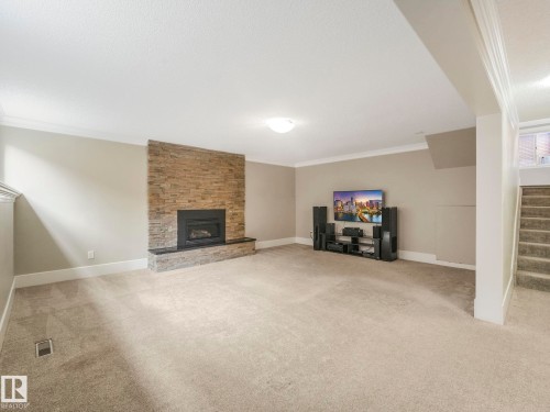5708 144 Street Nw, Edmonton, AB - Indoor Photo Showing Other Room With Fireplace