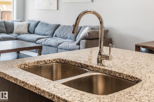 457 Orchards Boulevard Sw, Edmonton, AB - Indoor Photo Showing Kitchen With Double Sink