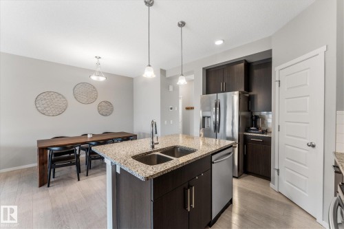 457 Orchards Boulevard Sw, Edmonton, AB - Indoor Photo Showing Kitchen With Double Sink With Upgraded Kitchen