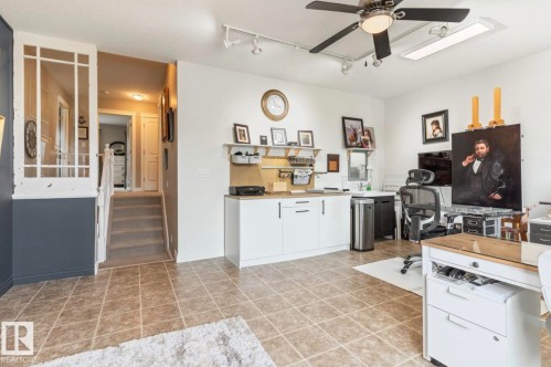 Open-concept living area featuring ceramic tile flooring, recessed lighting, and ceiling fan - 22 Voleta Crest, Spruce Grove, AB - Indoor Photo Showing Kitchen