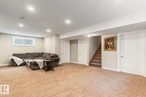 Carpeted lower level with recessed lighting, light-toned walls, and a window providing natural illumination - 22 Voleta Crest, Spruce Grove, AB - Indoor Photo Showing Basement