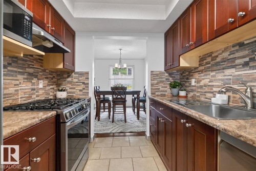 #23 3520 60 St Nw, Edmonton, AB - Indoor Photo Showing Kitchen With Upgraded Kitchen
