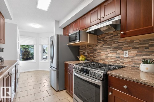 #23 3520 60 St Nw, Edmonton, AB - Indoor Photo Showing Kitchen With Stainless Steel Kitchen