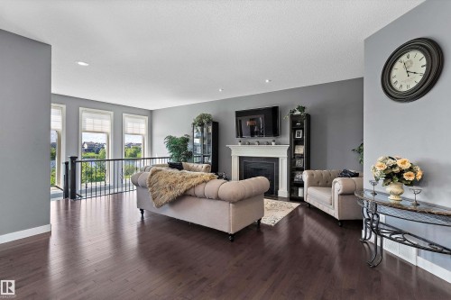 1708 32 Street Nw, Edmonton, AB - Indoor Photo Showing Living Room With Fireplace