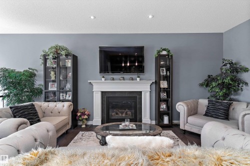 1708 32 Street Nw, Edmonton, AB - Indoor Photo Showing Living Room With Fireplace