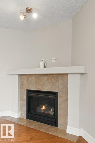 1636 Westerra Avenue, Stony Plain, AB - Indoor Photo Showing Living Room With Fireplace
