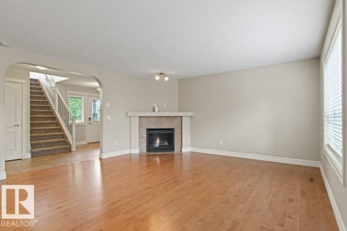 1636 Westerra Avenue, Stony Plain, AB - Indoor Photo Showing Living Room With Fireplace