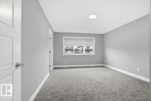 7633 Koruluk Place Sw, Edmonton, AB - Indoor Photo Showing Other Room