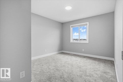 7633 Koruluk Place Sw, Edmonton, AB - Indoor Photo Showing Other Room