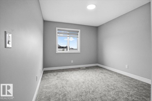 7633 Koruluk Place Sw, Edmonton, AB - Indoor Photo Showing Other Room