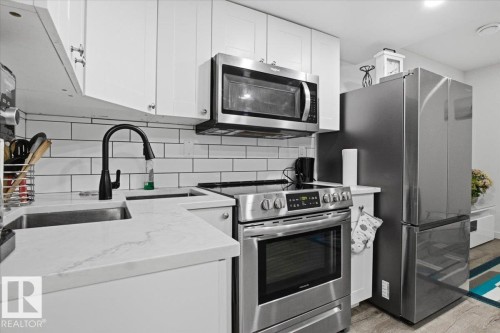 7633 Koruluk Place Sw, Edmonton, AB - Indoor Photo Showing Kitchen