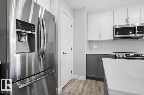 7633 Koruluk Place Sw, Edmonton, AB - Indoor Photo Showing Kitchen