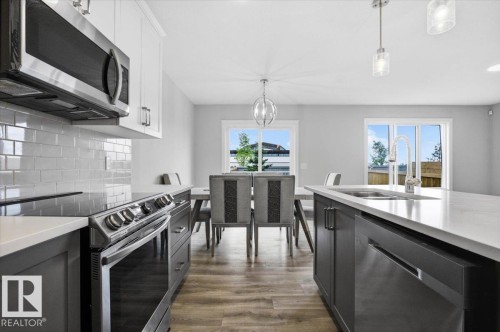 7633 Koruluk Place Sw, Edmonton, AB - Indoor Photo Showing Kitchen With Double Sink With Upgraded Kitchen