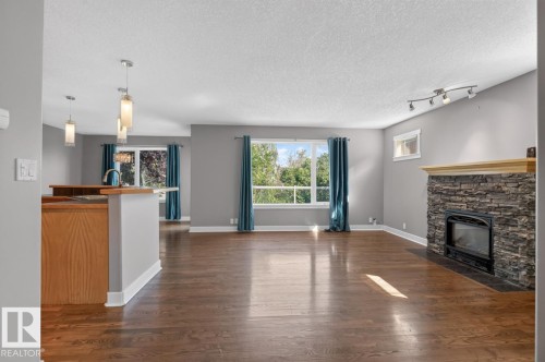 18 Cascade Crescent, Sherwood Park, AB - Indoor Photo Showing Living Room With Fireplace