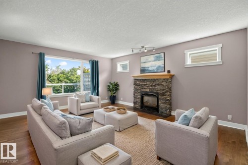 18 Cascade Crescent, Sherwood Park, AB - Indoor Photo Showing Living Room With Fireplace