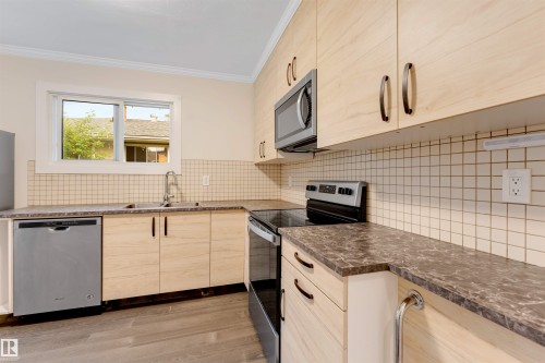 12105 87 Street Nw, Edmonton, AB - Indoor Photo Showing Kitchen With Double Sink With Upgraded Kitchen