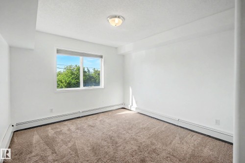 #203 8119 112 Av Nw, Edmonton, AB - Indoor Photo Showing Other Room