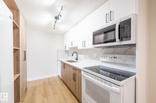 14 Amberly Court Nw, Edmonton, AB - Indoor Photo Showing Kitchen With Double Sink