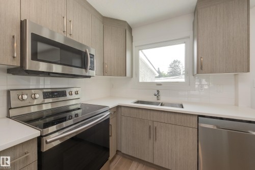 13112 90 Street Nw, Edmonton, AB - Indoor Photo Showing Kitchen With Double Sink