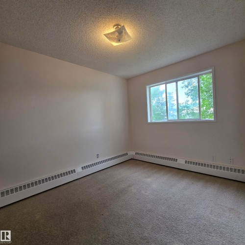 #201 17467 98A Av Nw, Edmonton, AB - Indoor Photo Showing Other Room