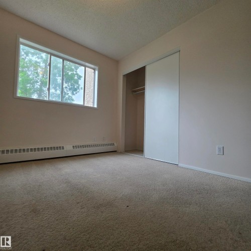 #201 17467 98A Av Nw, Edmonton, AB - Indoor Photo Showing Other Room