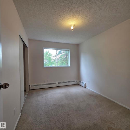 #201 17467 98A Av Nw, Edmonton, AB - Indoor Photo Showing Other Room