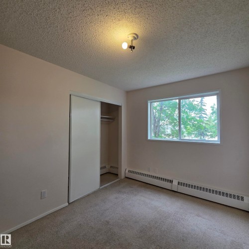 #201 17467 98A Av Nw, Edmonton, AB - Indoor Photo Showing Other Room
