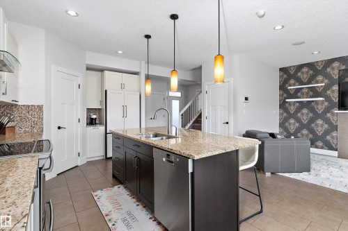 5811 Mullen Place Nw, Edmonton, AB - Indoor Photo Showing Kitchen With Double Sink With Upgraded Kitchen