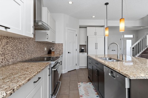 5811 Mullen Place Nw, Edmonton, AB - Indoor Photo Showing Kitchen With Double Sink With Upgraded Kitchen