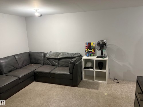 #18 4900 62 St, Beaumont, AB - Indoor Photo Showing Living Room