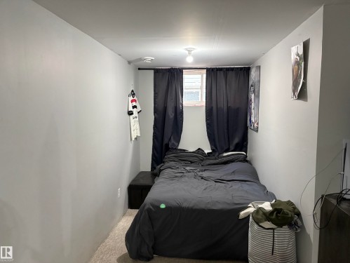 #18 4900 62 St, Beaumont, AB - Indoor Photo Showing Bedroom