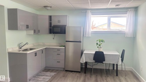 7935 22 Avenue Nw, Edmonton, AB - Indoor Photo Showing Kitchen With Double Sink