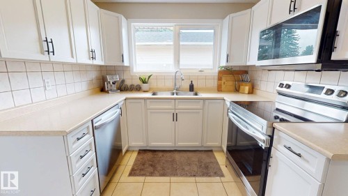 7935 22 Avenue Nw, Edmonton, AB - Indoor Photo Showing Kitchen With Double Sink