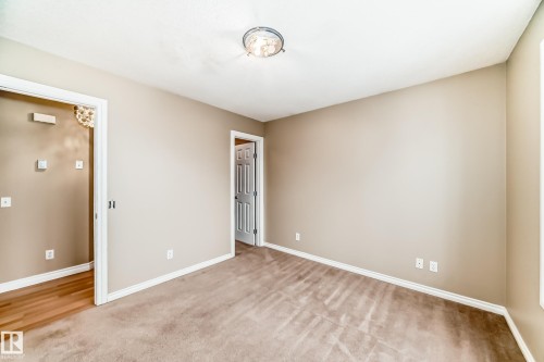 #48 150 Edwards Dr Sw, Edmonton, AB - Indoor Photo Showing Other Room