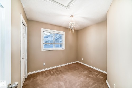 #48 150 Edwards Dr Sw, Edmonton, AB - Indoor Photo Showing Other Room
