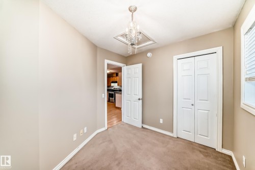 #48 150 Edwards Dr Sw, Edmonton, AB - Indoor Photo Showing Other Room