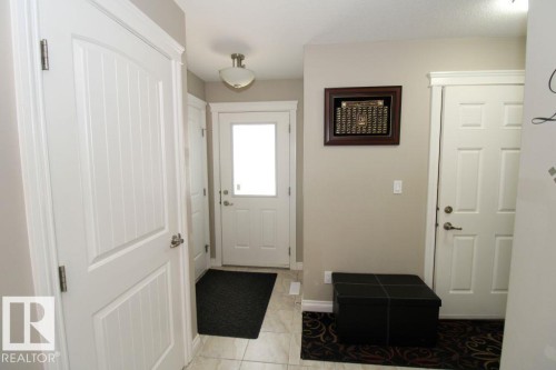 Entryway featuring light neutral wall paint and a semi-flush mount ceiling light - 3048 Harvey Crescent Nw, Edmonton, AB - Indoor Photo Showing Other Room
