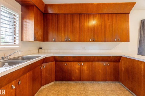10013 98 Avenue, Morinville, AB - Indoor Photo Showing Kitchen With Double Sink