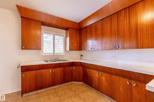 10013 98 Avenue, Morinville, AB - Indoor Photo Showing Kitchen With Double Sink