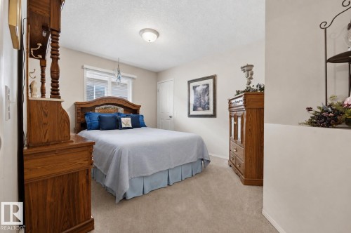 28 Norfolk Close, St. Albert, AB - Indoor Photo Showing Bedroom