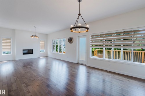 1504 Ainslie Place Sw, Edmonton, AB - Indoor Photo Showing Living Room With Fireplace