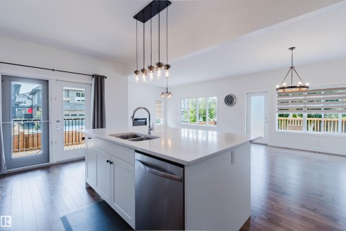 1504 Ainslie Place Sw, Edmonton, AB - Indoor Photo Showing Kitchen With Double Sink