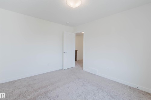 1504 Ainslie Place Sw, Edmonton, AB - Indoor Photo Showing Other Room