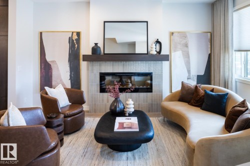 216 Chappelle Drive Sw, Edmonton, AB - Indoor Photo Showing Living Room With Fireplace