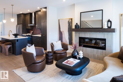 216 Chappelle Drive Sw, Edmonton, AB - Indoor Photo Showing Living Room With Fireplace